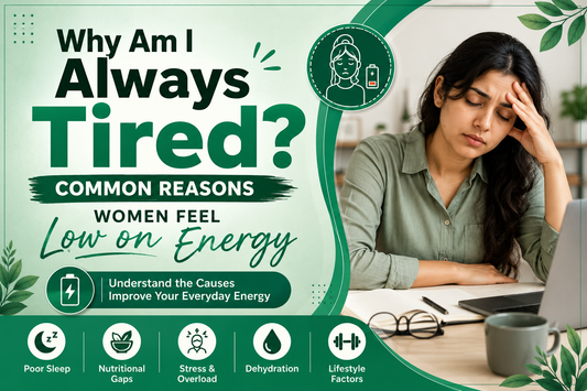 Woman feeling tired and low on energy while sitting at home, representing common causes of fatigue in women